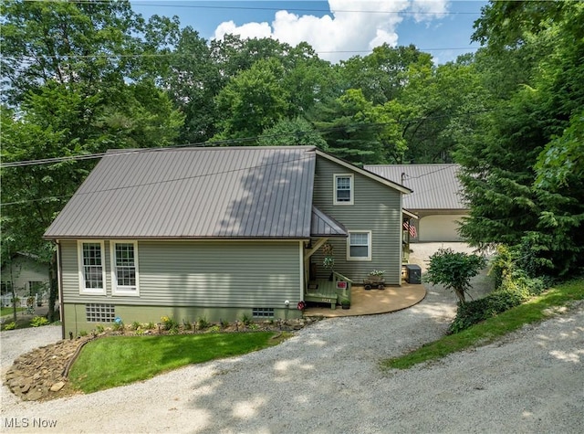 2461 Trailwood Dr SW, Carrollton, OH 44615 - view of front of home with a metal roof