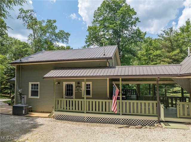 2461 Trailwood Dr SW, Carrollton, OH 44615 - view of front of house featuring a metal roof and covered porch