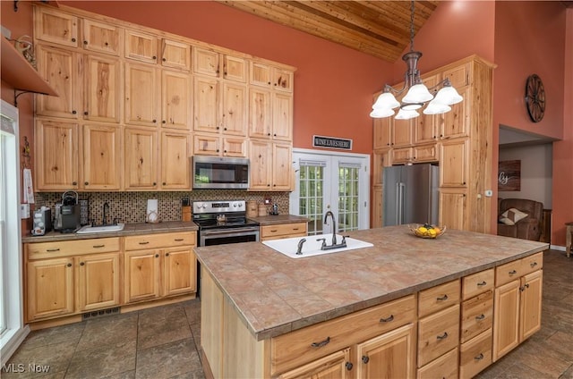 2461 Trailwood Dr SW, Carrollton, OH 44615 - kitchen with appliances with stainless steel finishes, high vaulted ceiling, wood ceiling, french doors, and backsplash
