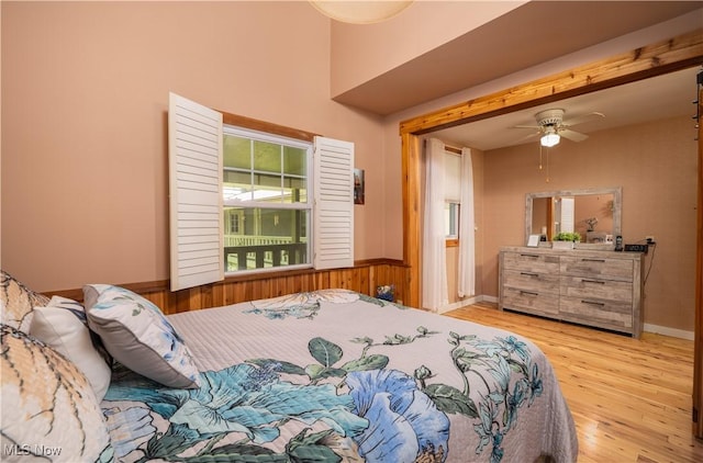 2461 Trailwood Dr SW, Carrollton, OH 44615 - bedroom featuring wood finished floors, a wainscoted wall, and wood walls