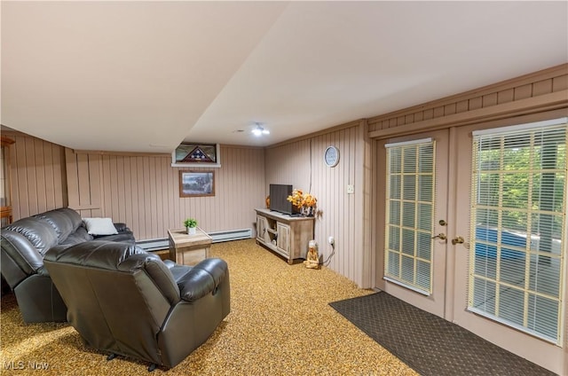 2461 Trailwood Dr SW, Carrollton, OH 44615 - carpeted living room featuring french doors, a baseboard radiator, and wooden walls