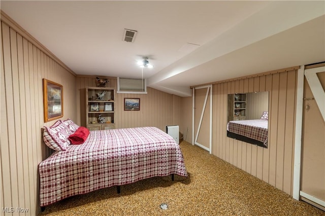 2461 Trailwood Dr SW, Carrollton, OH 44615 - carpeted bedroom with wood walls