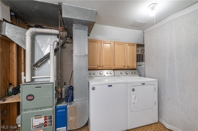 2461 Trailwood Dr SW, Carrollton, OH 44615 - laundry room featuring cabinet space and separate washer and dryer
