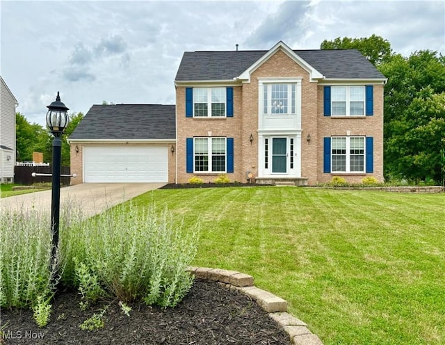 11208 Glen Abbey Dr, North Royalton, OH 44133 - colonial-style house with an attached garage, a front yard, concrete driveway, and brick siding