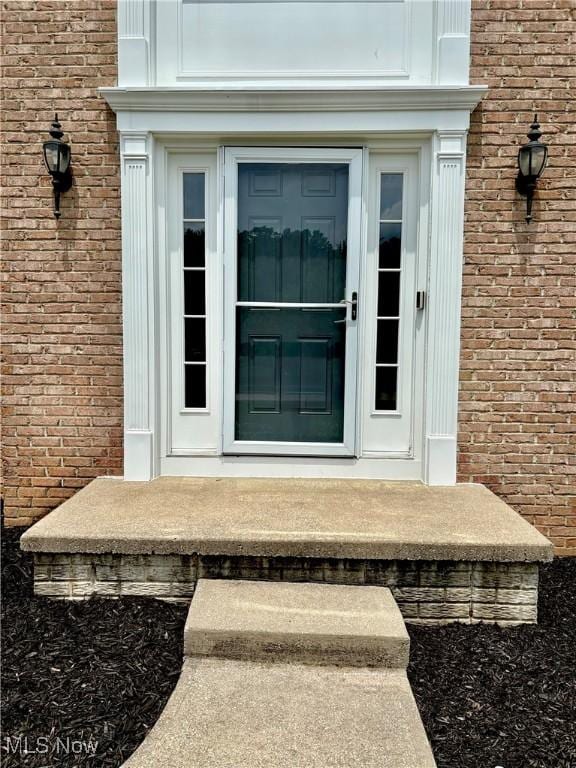 11208 Glen Abbey Dr, North Royalton, OH 44133 - view of exterior entry with brick siding