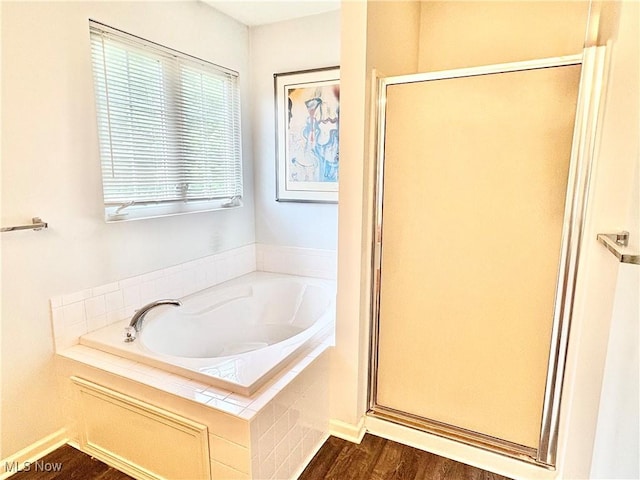 11208 Glen Abbey Dr, North Royalton, OH 44133 - full bath with a stall shower, a bath, and wood finished floors