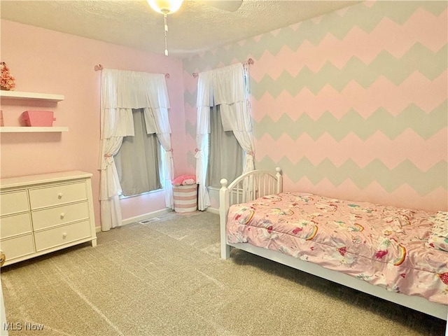 11208 Glen Abbey Dr, North Royalton, OH 44133 - bedroom featuring a textured ceiling, carpet floors, wallpapered walls, and a ceiling fan