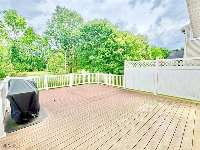 11208 Glen Abbey Dr, North Royalton, OH 44133 - wooden deck featuring a grill