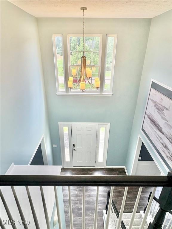 11208 Glen Abbey Dr, North Royalton, OH 44133 - foyer featuring a chandelier and stairway