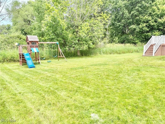 11208 Glen Abbey Dr, North Royalton, OH 44133 - view of green lawn with a playground and stairway