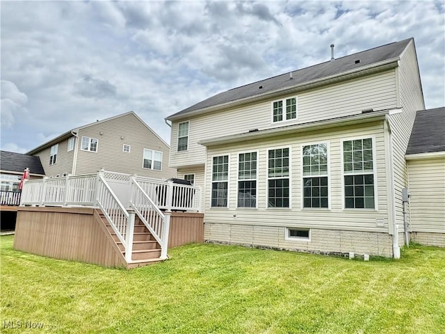 11208 Glen Abbey Dr, North Royalton, OH 44133 - rear view of property with stairs, a wooden deck, and a lawn