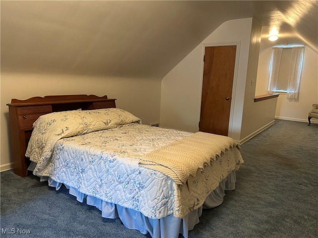 145 Marcia Dr, Austintown, OH 44515 - carpeted bedroom featuring lofted ceiling and baseboards