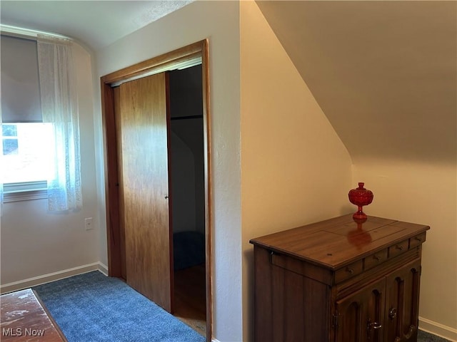 145 Marcia Dr, Austintown, OH 44515 - hallway featuring baseboards and lofted ceiling