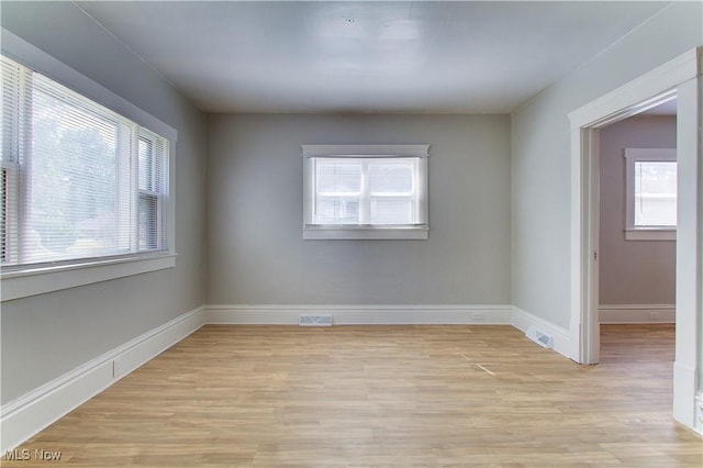 1213 Mckinley Ave, Akron, OH 44306 - spare room with plenty of natural light and light wood-style floors