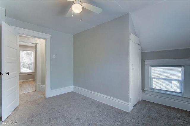 1213 Mckinley Ave, Akron, OH 44306 - carpeted spare room with vaulted ceiling and ceiling fan