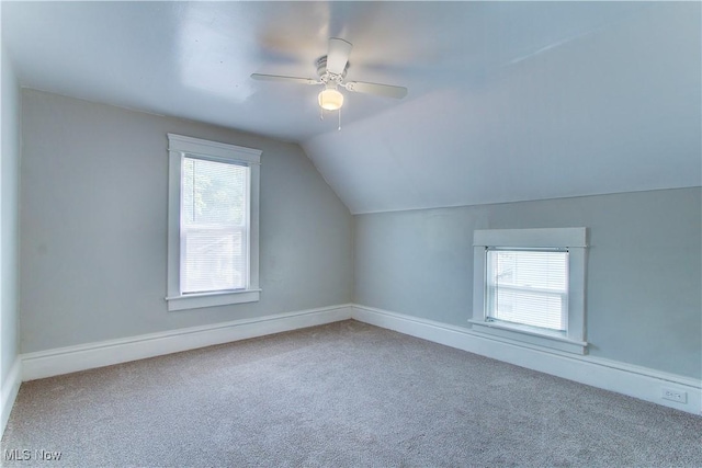 1213 Mckinley Ave, Akron, OH 44306 - additional living space featuring carpet flooring, vaulted ceiling, and ceiling fan