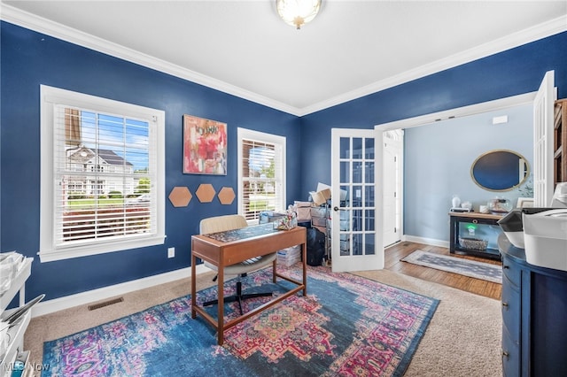 2940 Londonbury St NW, Uniontown, OH 44685 - carpeted home office with french doors and crown molding