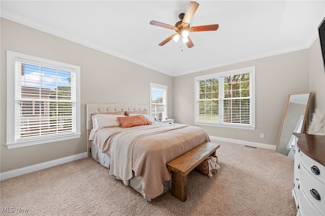 2940 Londonbury St NW, Uniontown, OH 44685 - bedroom with crown molding, multiple windows, light carpet, and a ceiling fan