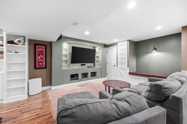 2940 Londonbury St NW, Uniontown, OH 44685 - home theater with recessed lighting, built in features, and light wood-type flooring