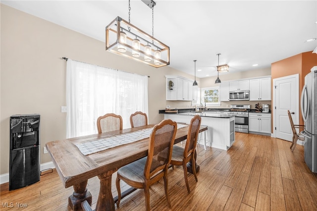 2940 Londonbury St NW, Uniontown, OH 44685 - dining space with recessed lighting and light wood-type flooring