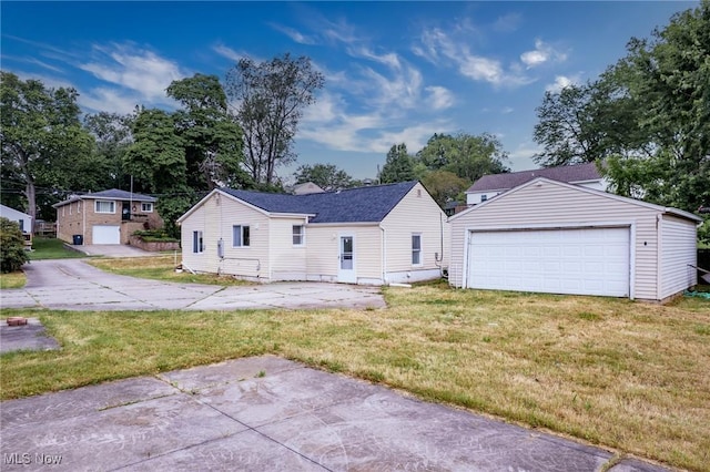 85 Pocantico Ave, Akron, OH 44312 - view of front facade featuring an outbuilding, a front yard, and a detached garage
