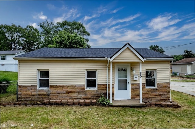85 Pocantico Ave, Akron, OH 44312 - bungalow-style house with stone siding and roof with shingles