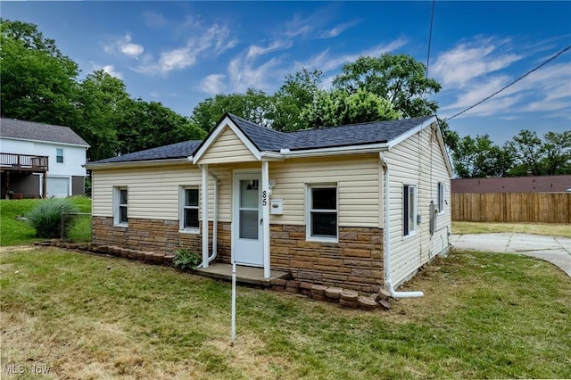 85 Pocantico Ave, Akron, OH 44312 - view of front facade with stone siding and a shingled roof