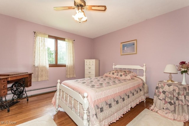 13228 Boulder, Chesterland, OH 44026 - bedroom featuring wood finished floors and a ceiling fan