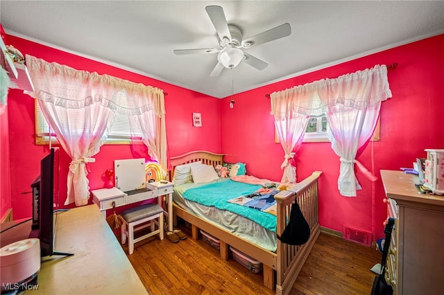 28666 Forest Rd, Willowick, OH 44095 - bedroom featuring multiple windows, wood finished floors, and a ceiling fan