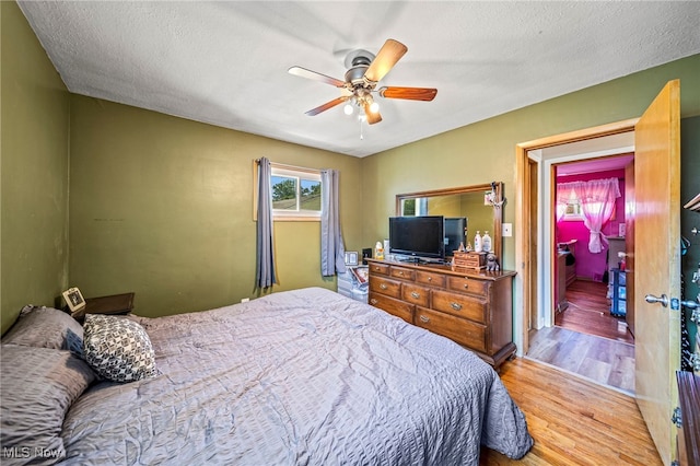 28666 Forest Rd, Willowick, OH 44095 - bedroom featuring wood finished floors, ceiling fan, and a textured ceiling