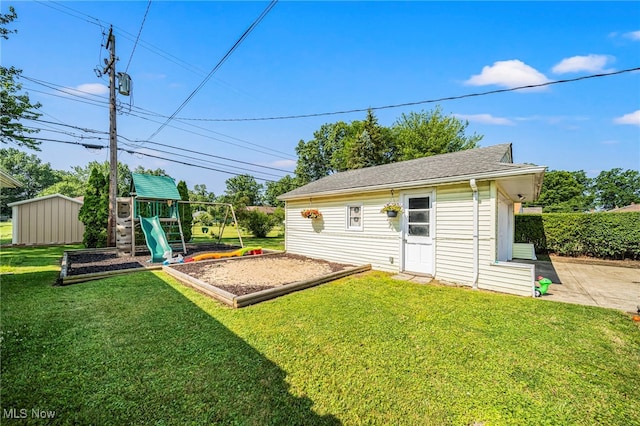 28666 Forest Rd, Willowick, OH 44095 - view of grassy yard featuring an outbuilding and a playground