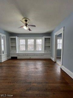 1114 E 64th St, Cleveland, OH 44103 - unfurnished room featuring ceiling fan and wood finished floors