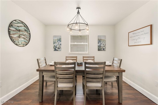5111 N Myers Rd, Geneva, OH 44041 - dining space with dark wood finished floors and a chandelier