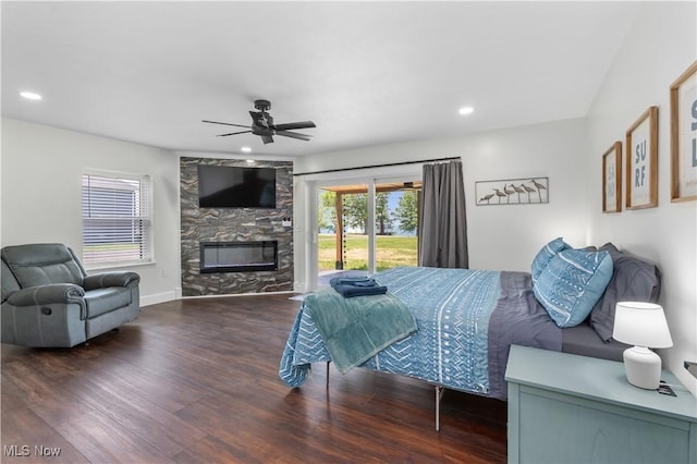 5111 N Myers Rd, Geneva, OH 44041 - bedroom featuring wood finished floors, a fireplace, a ceiling fan, recessed lighting, and access to outside