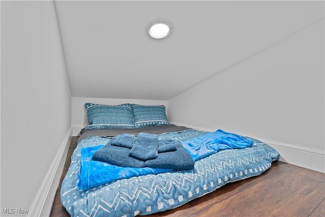 5111 N Myers Rd, Geneva, OH 44041 - bedroom featuring lofted ceiling and wood finished floors