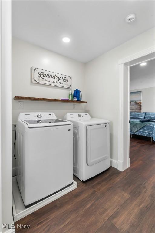 5111 N Myers Rd, Geneva, OH 44041 - laundry room with washer and clothes dryer, dark wood finished floors, and recessed lighting