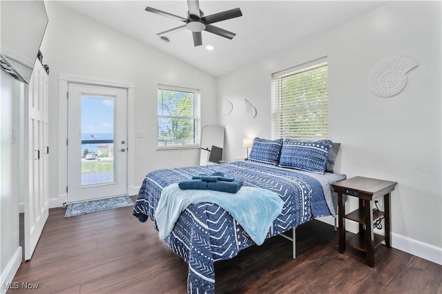 5111 N Myers Rd, Geneva, OH 44041 - bedroom featuring multiple windows, vaulted ceiling, wood finished floors, a ceiling fan, and recessed lighting