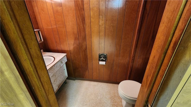 138 Marsha St, Weirton, WV 26062 - bathroom featuring vanity and wooden walls