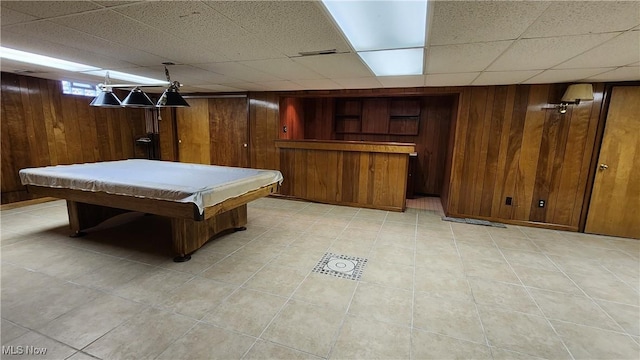 138 Marsha St, Weirton, WV 26062 - playroom featuring wood walls, a paneled ceiling, billiards table, and light tile patterned floors