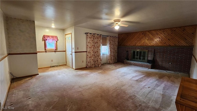 138 Marsha St, Weirton, WV 26062 - unfurnished living room with ceiling fan, carpet floors, and a brick fireplace