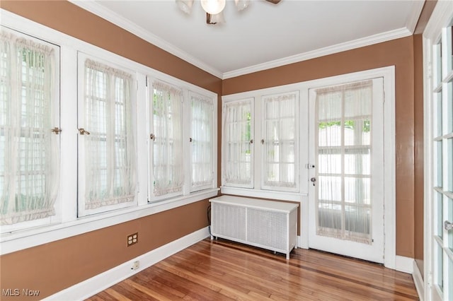 3336 Daleford Rd, Shaker Heights, OH 44120 - unfurnished sunroom with french doors and radiator heating unit