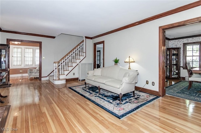3336 Daleford Rd, Shaker Heights, OH 44120 - living room with hardwood / wood-style flooring, crown molding, and stairway