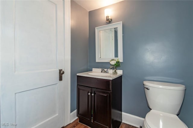 3336 Daleford Rd, Shaker Heights, OH 44120 - half bathroom with vanity and wood finished floors