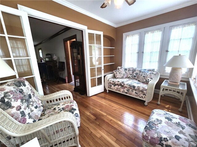 3336 Daleford Rd, Shaker Heights, OH 44120 - living area featuring crown molding, hardwood / wood-style flooring, and ceiling fan