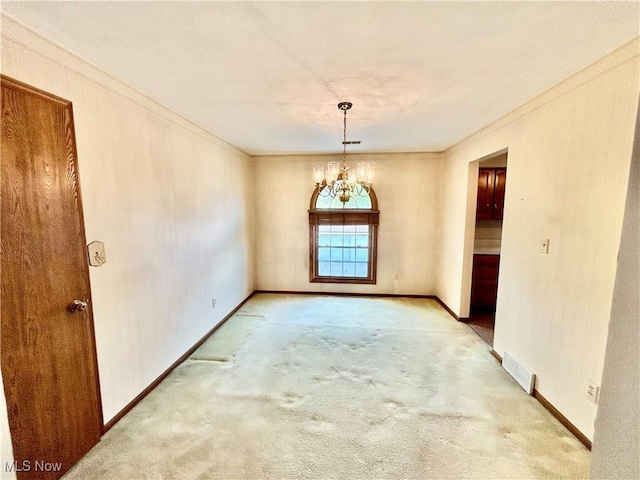930 Pearson Cir Unit 4, Youngstown, OH 44512 - carpeted spare room featuring a chandelier and ornamental molding