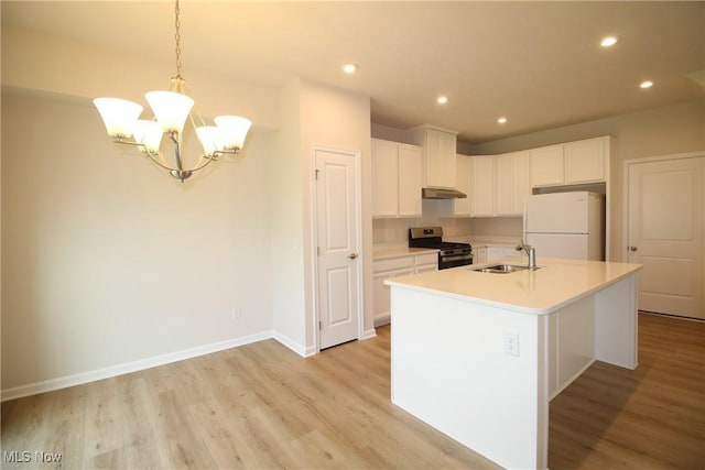 1627 Cypress Rd, Stow, OH 44224 - kitchen with freestanding refrigerator, electric stove, a chandelier, light wood finished floors, and recessed lighting