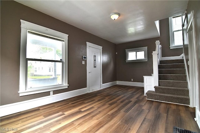 1134 Auburn Pl NW, Canton, OH 44703 - foyer entrance featuring dark wood-type flooring and stairs