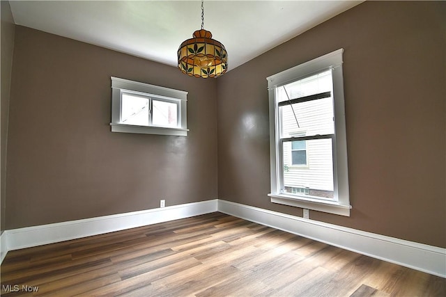 1134 Auburn Pl NW, Canton, OH 44703 - spare room with wood finished floors