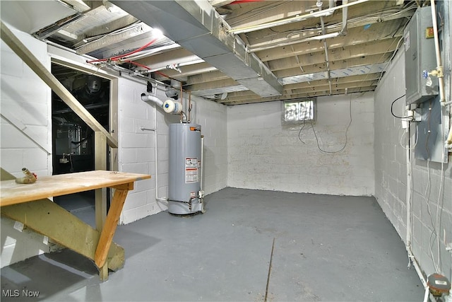 1134 Auburn Pl NW, Canton, OH 44703 - below grade area with water heater and concrete block wall