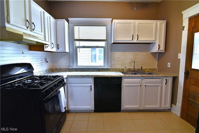 1134 Auburn Pl NW, Canton, OH 44703 - kitchen with black appliances, under cabinet range hood, white cabinetry, backsplash, and light stone counters